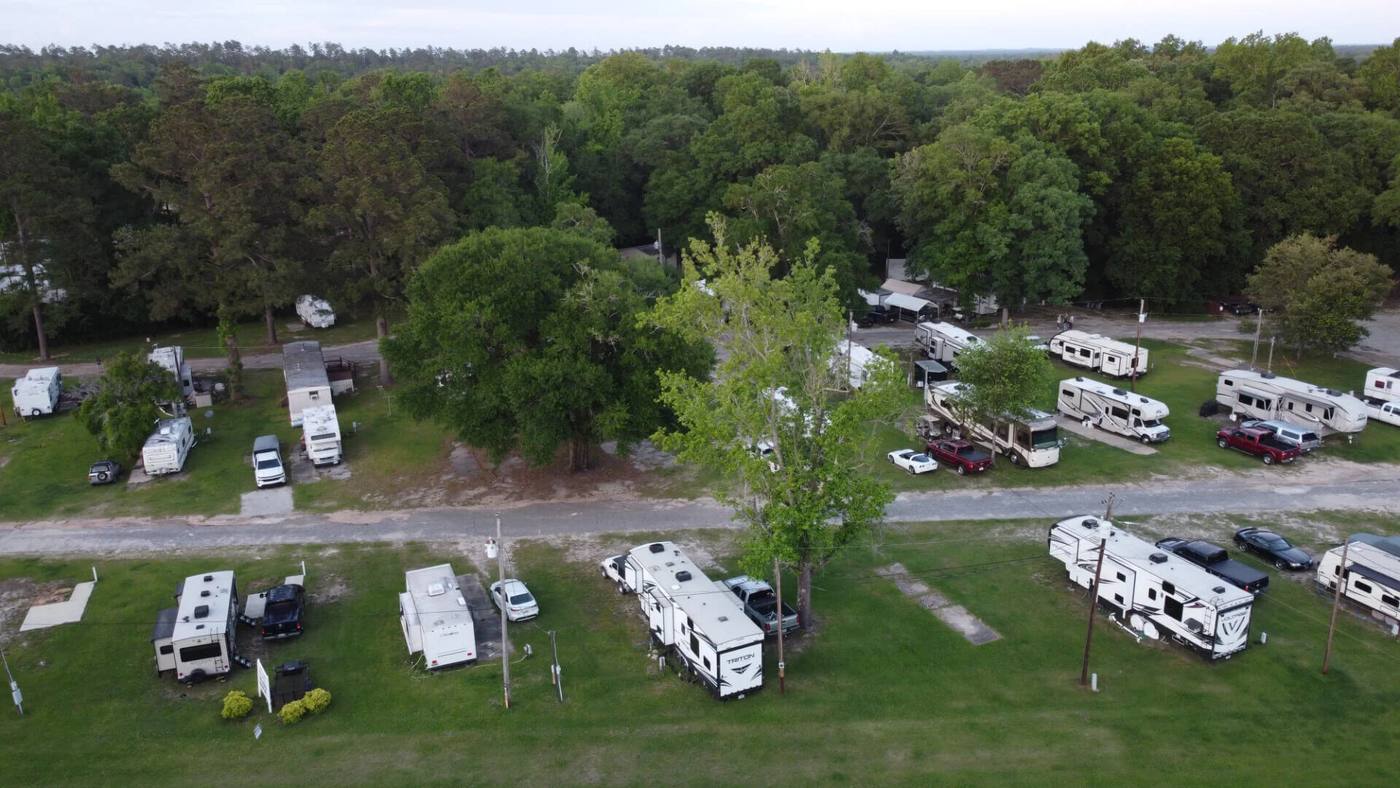 Aerial view of rows of RV sites at Branching Pines
