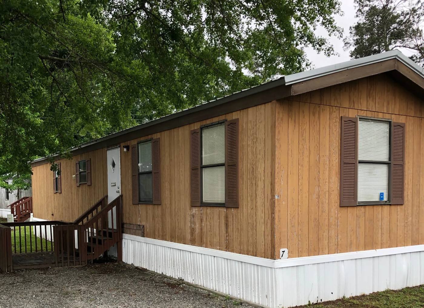 Wood-sided rental home with a porch